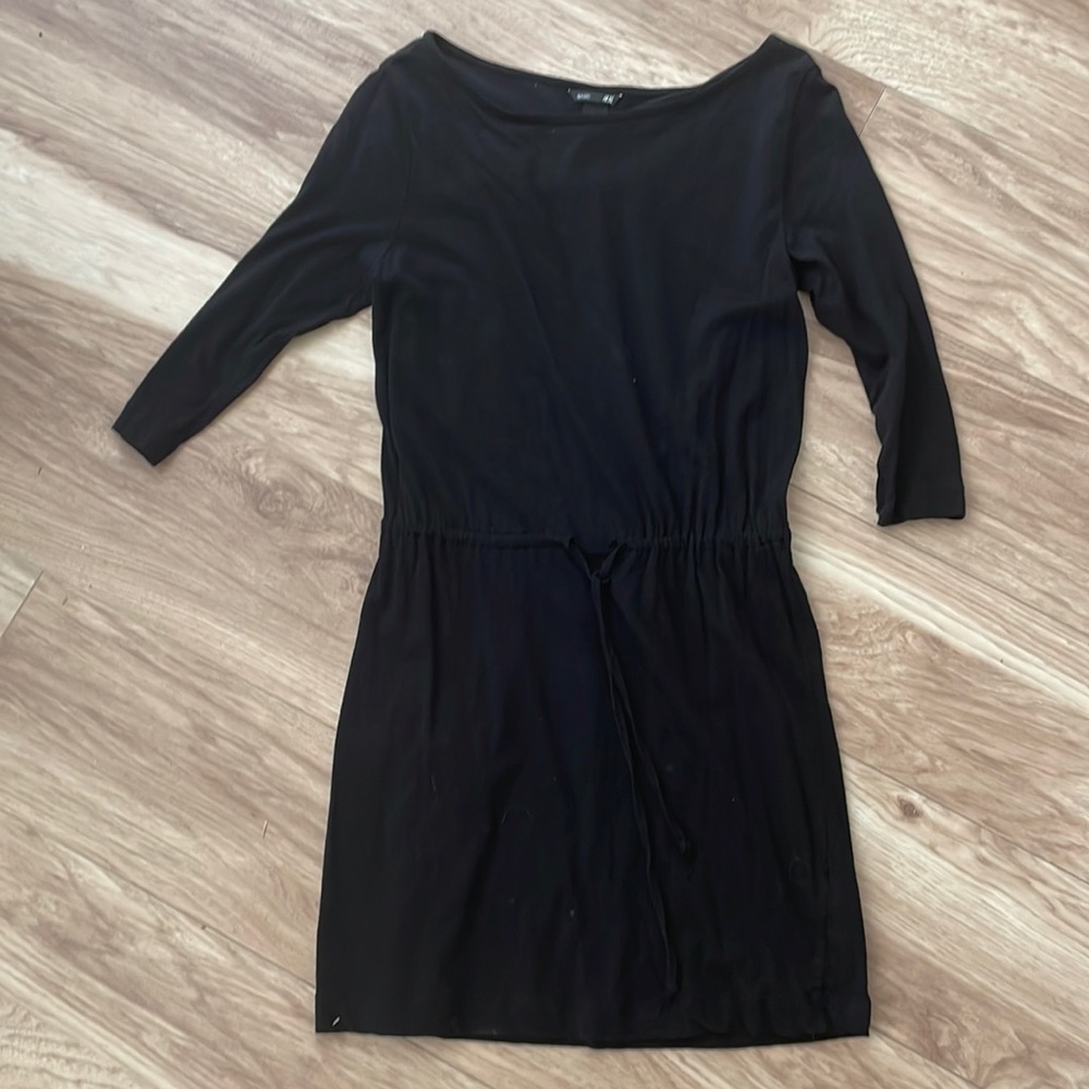 Black quarter length sleeve knee length dress